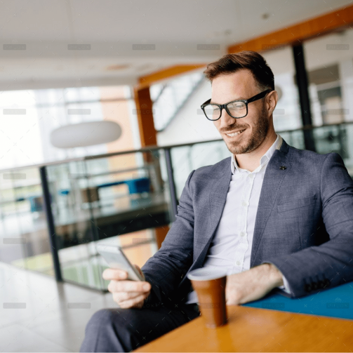 demo-attachment-46-businessman-taking-a-break-with-a-cup-of-coffee-JW4B3DH